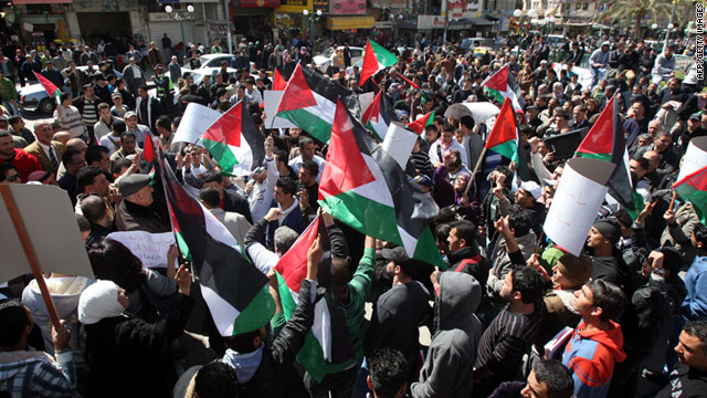 Palestinians demonstrated for unity between Fatah and Hamas in Nablus in the northern West Bank on Tuesday.